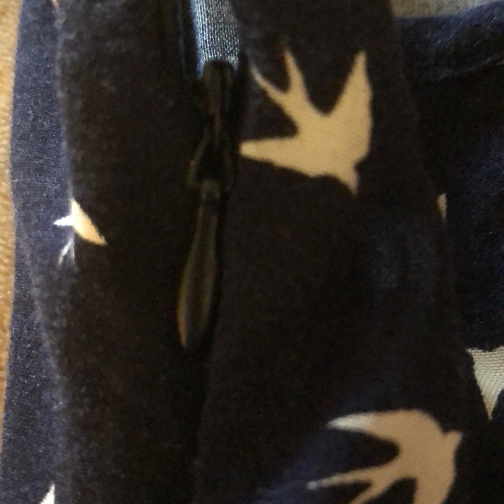 Sundress with high low sides and a box open back.